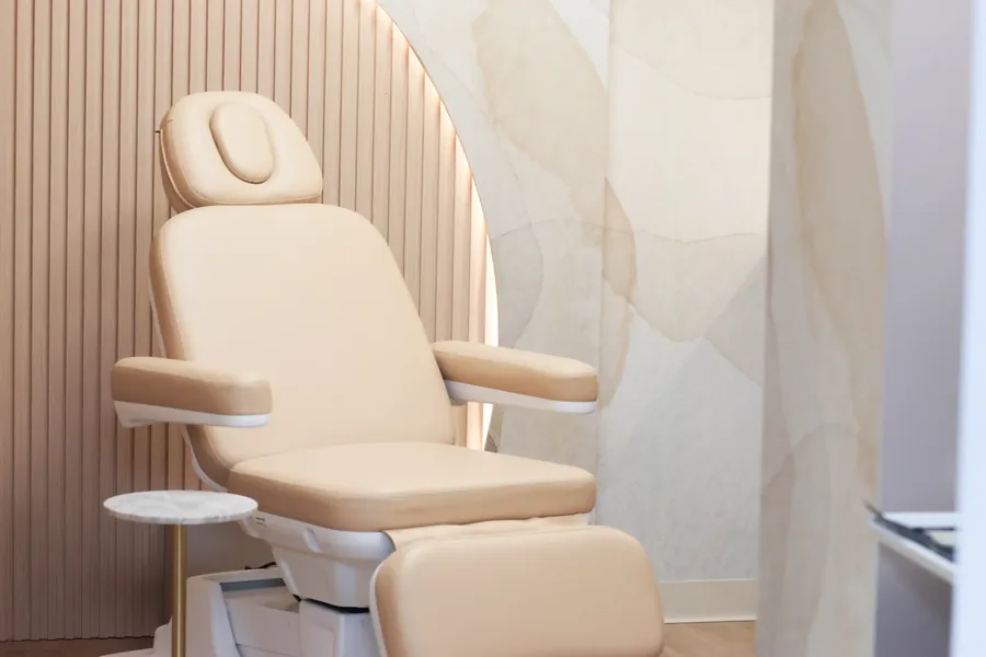 Cream treatment chair in the dental spa room at Restore Dental Aesthetics