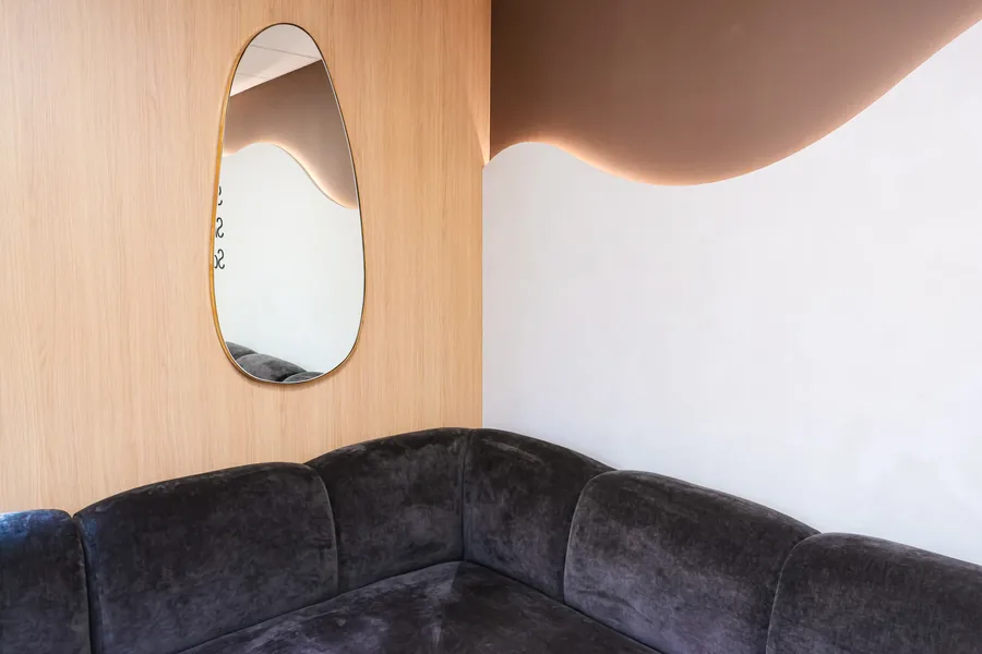 Corner seating in the waiting room at Restore Dental Aesthetics